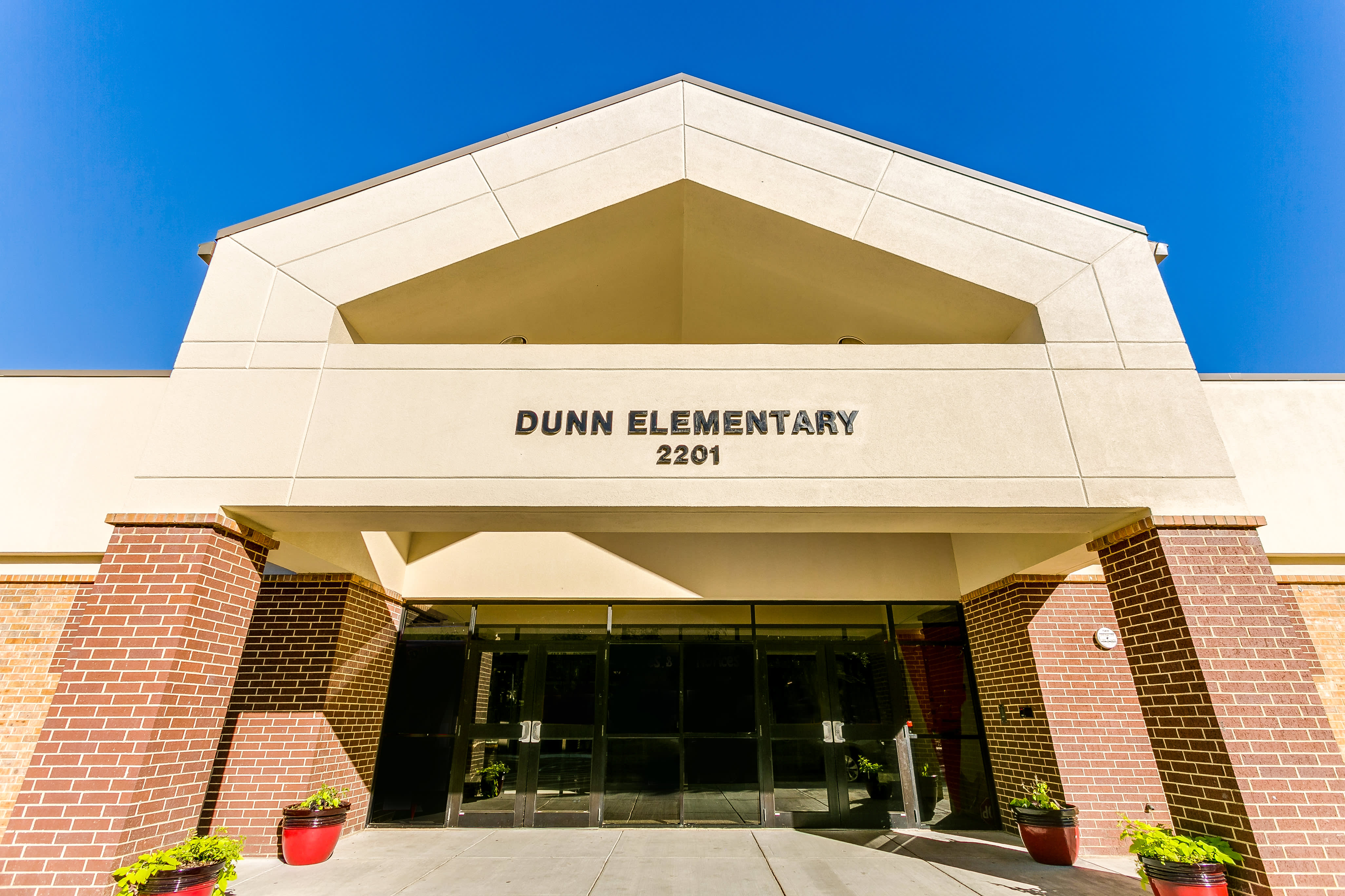 added parking lots upgraded security cameras and pa system architect